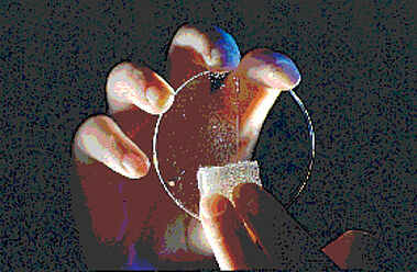 Veredelung von Kunststofflinsen